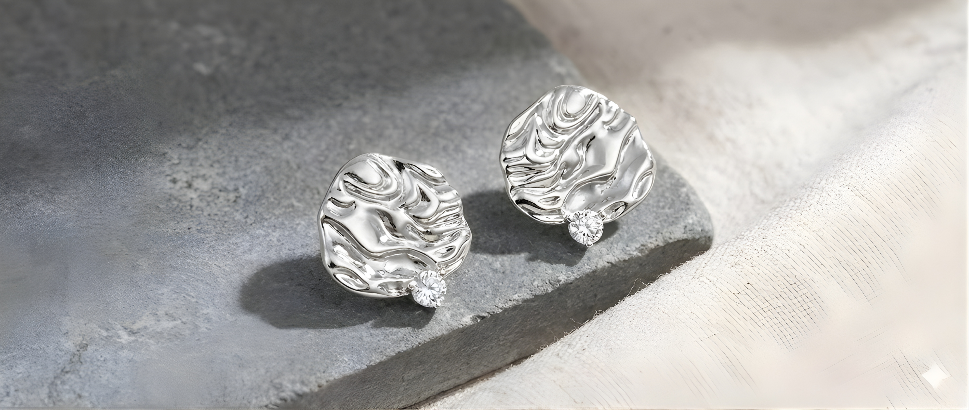 Textured silver stud earrings with organic sculptural surface by SUPA MOI1621243260e1af0c20-1